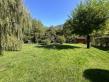 VILLA AVEC GRAND TERRAIN PLAT